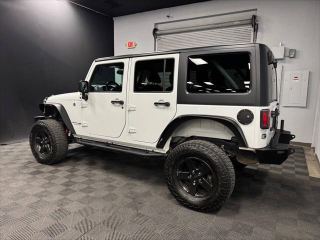 used 2018 Jeep Wrangler JK Unlimited car, priced at $23,398