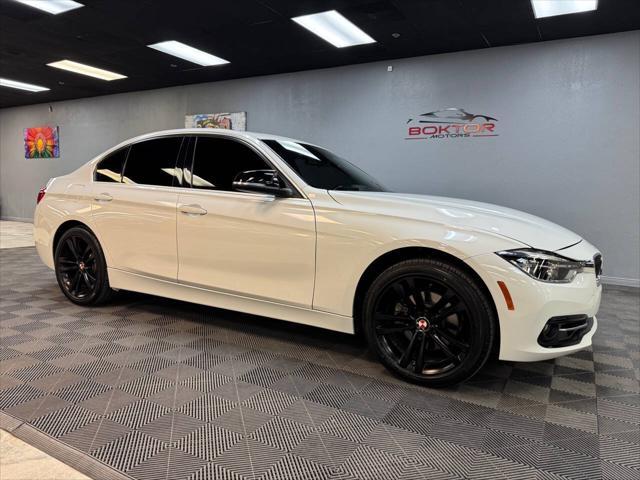 used 2018 BMW 330 car, priced at $18,998