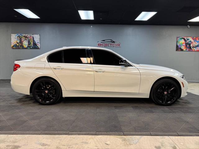 used 2018 BMW 330 car, priced at $18,998