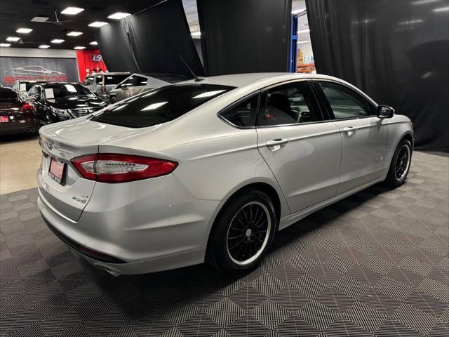 used 2015 Ford Fusion Hybrid car, priced at $10,799