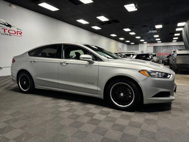 used 2015 Ford Fusion Hybrid car, priced at $10,799