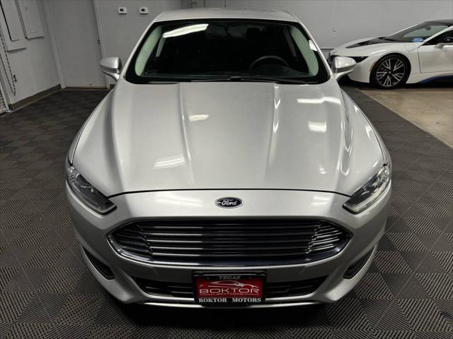 used 2015 Ford Fusion Hybrid car, priced at $10,799