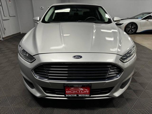 used 2015 Ford Fusion Hybrid car, priced at $10,799