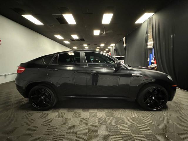 used 2012 BMW X6 M car, priced at $18,399