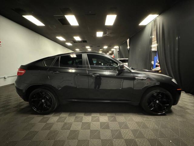 used 2012 BMW X6 M car, priced at $18,399