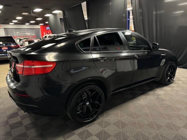 used 2012 BMW X6 M car, priced at $18,399