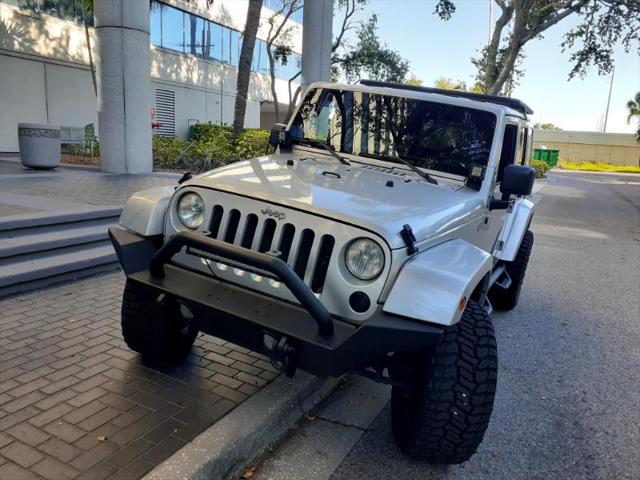 used 2012 Jeep Wrangler Unlimited car, priced at $18,950