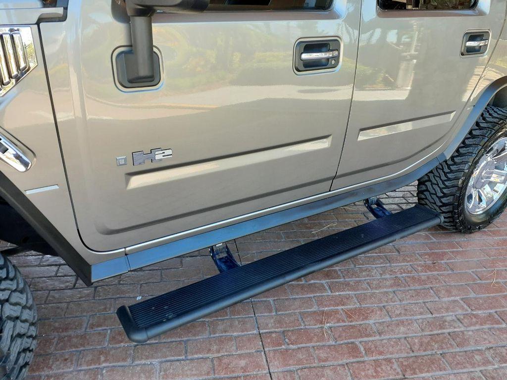 used 2009 Hummer H2 car, priced at $44,950