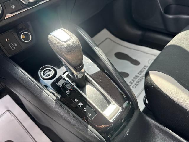used 2021 Nissan Versa car, priced at $15,000
