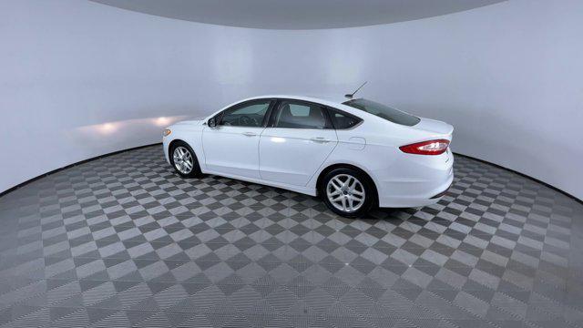 used 2016 Ford Fusion car, priced at $7,300