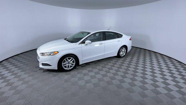 used 2016 Ford Fusion car, priced at $7,300