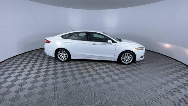 used 2016 Ford Fusion car, priced at $7,300