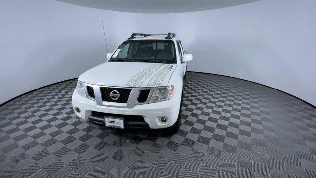 used 2015 Nissan Frontier car, priced at $14,500