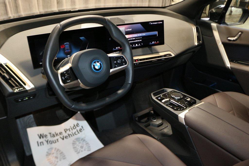 used 2024 BMW iX car, priced at $59,000