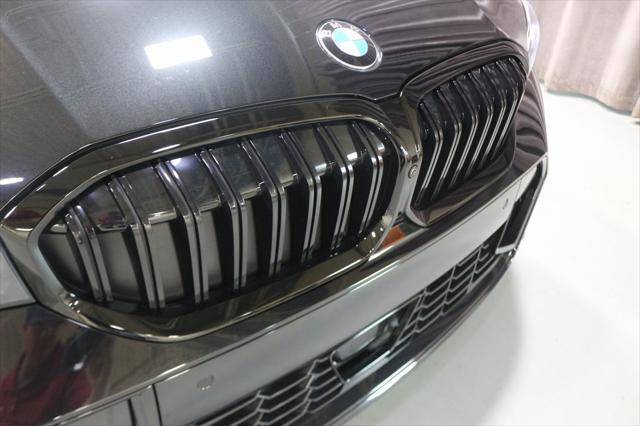 new 2025 BMW 330 car, priced at $57,075