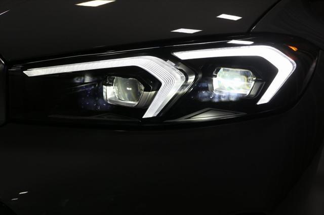 new 2025 BMW 330 car, priced at $53,975