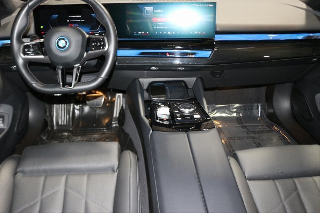 used 2024 BMW i5 car, priced at $73,000