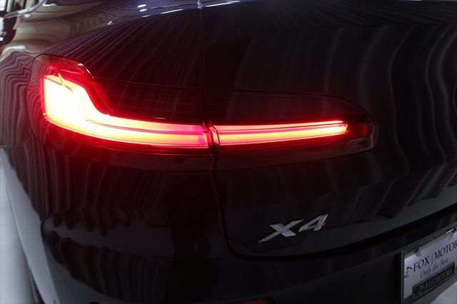 used 2023 BMW X4 car, priced at $46,500