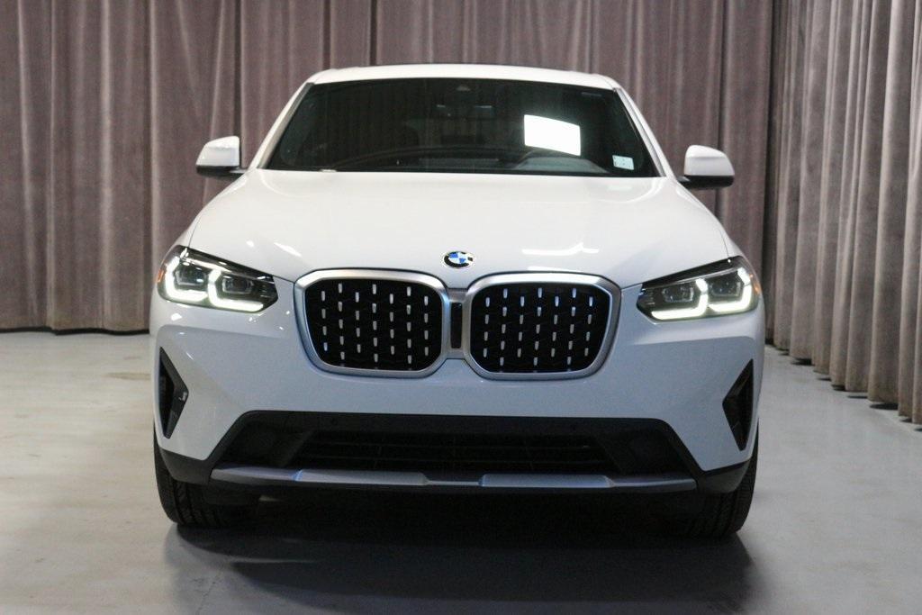used 2023 BMW X4 car, priced at $50,000