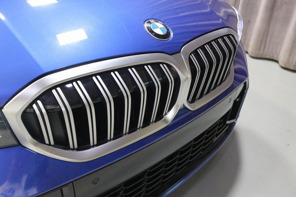 new 2025 BMW 330 car, priced at $53,975
