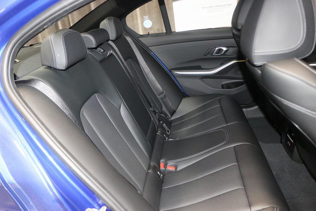 new 2025 BMW 330 car, priced at $53,975