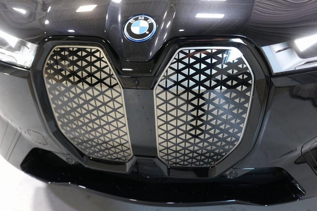 new 2024 BMW iX car, priced at $96,245