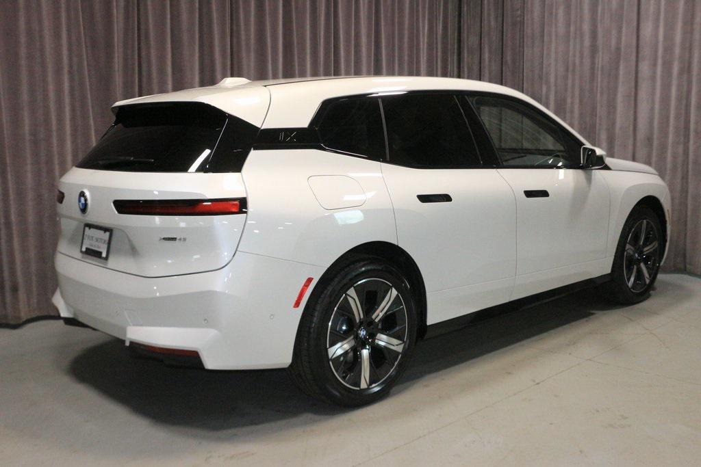 new 2026 BMW iX car, priced at $84,725