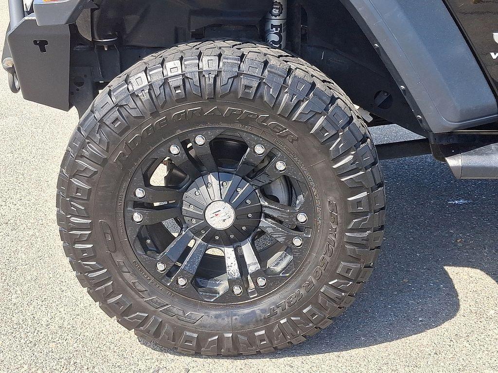 used 2018 Jeep Wrangler Unlimited car, priced at $24,721