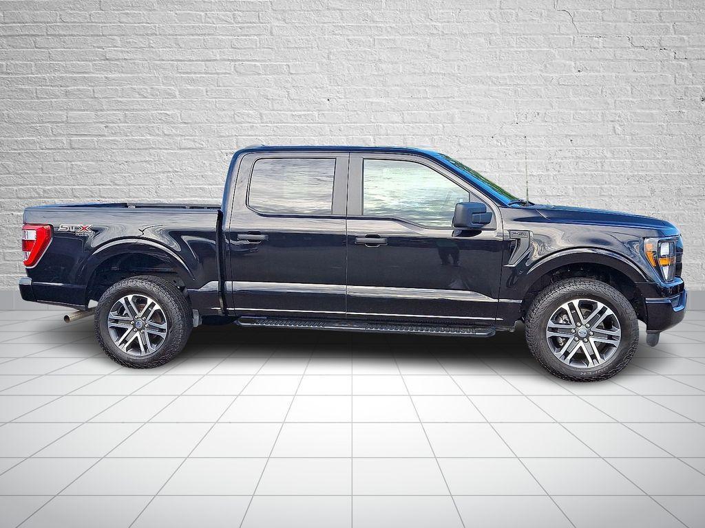 used 2023 Ford F-150 car, priced at $34,410