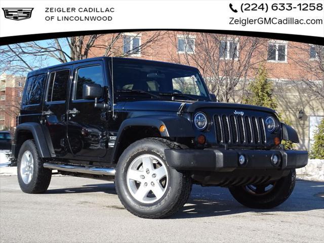 used 2011 Jeep Wrangler Unlimited car, priced at $16,400