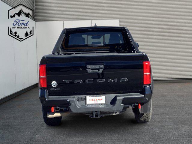 used 2024 Toyota Tacoma car, priced at $45,873
