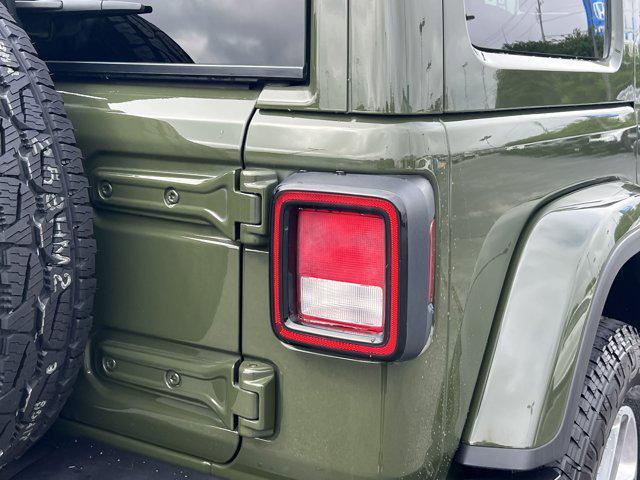 used 2021 Jeep Wrangler Unlimited car, priced at $31,464