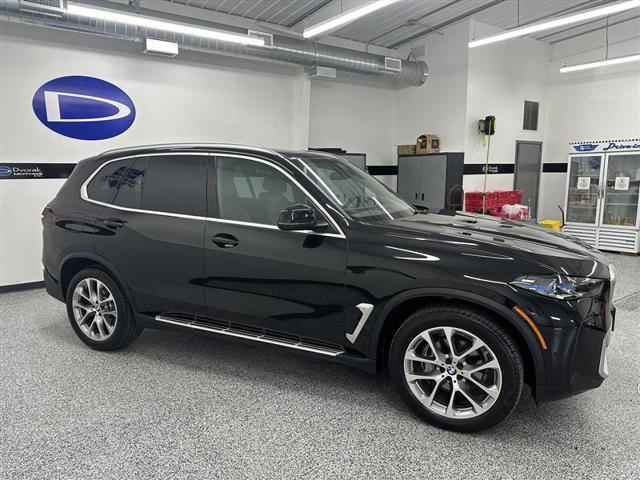 used 2024 BMW X5 car, priced at $65,995