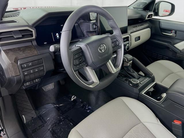 used 2024 Toyota Tacoma car, priced at $49,998