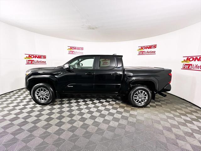 used 2024 Toyota Tacoma car, priced at $49,998