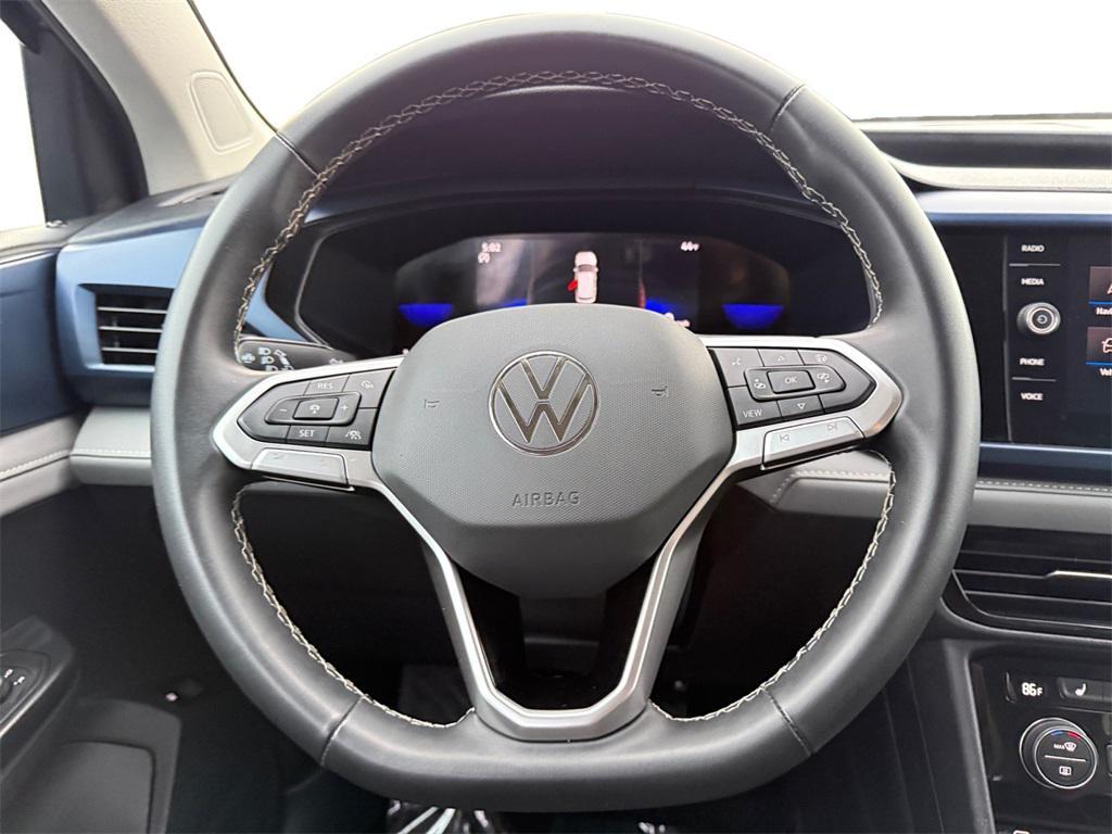 used 2024 Volkswagen Taos car, priced at $21,099