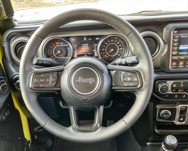 used 2023 Jeep Wrangler car, priced at $35,287