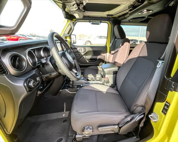 used 2023 Jeep Wrangler car, priced at $35,287