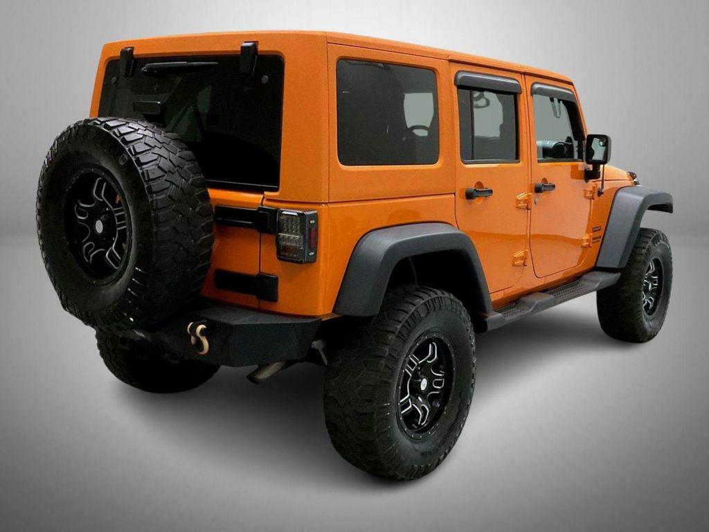 used 2013 Jeep Wrangler Unlimited car, priced at $17,655