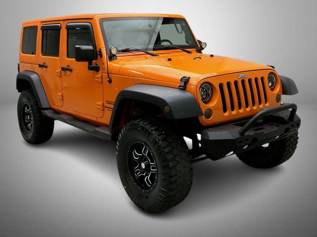 used 2013 Jeep Wrangler Unlimited car, priced at $17,655