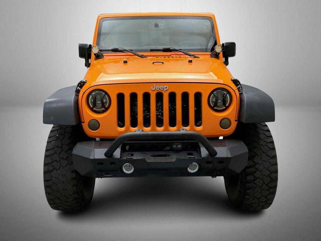 used 2013 Jeep Wrangler Unlimited car, priced at $17,655