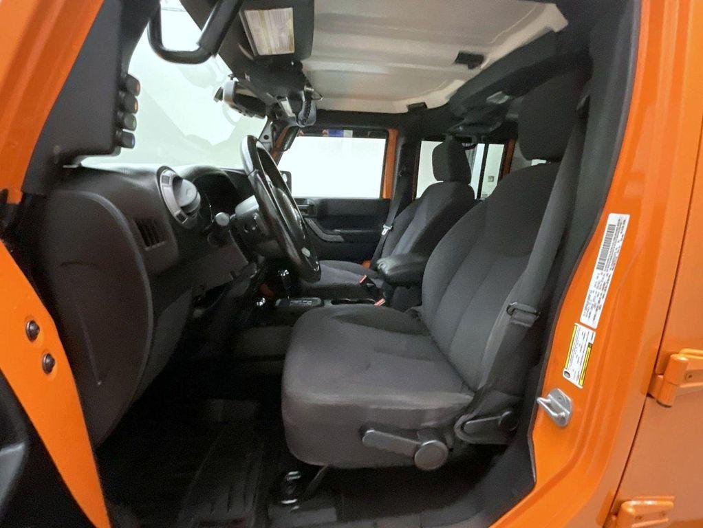 used 2013 Jeep Wrangler Unlimited car, priced at $17,655