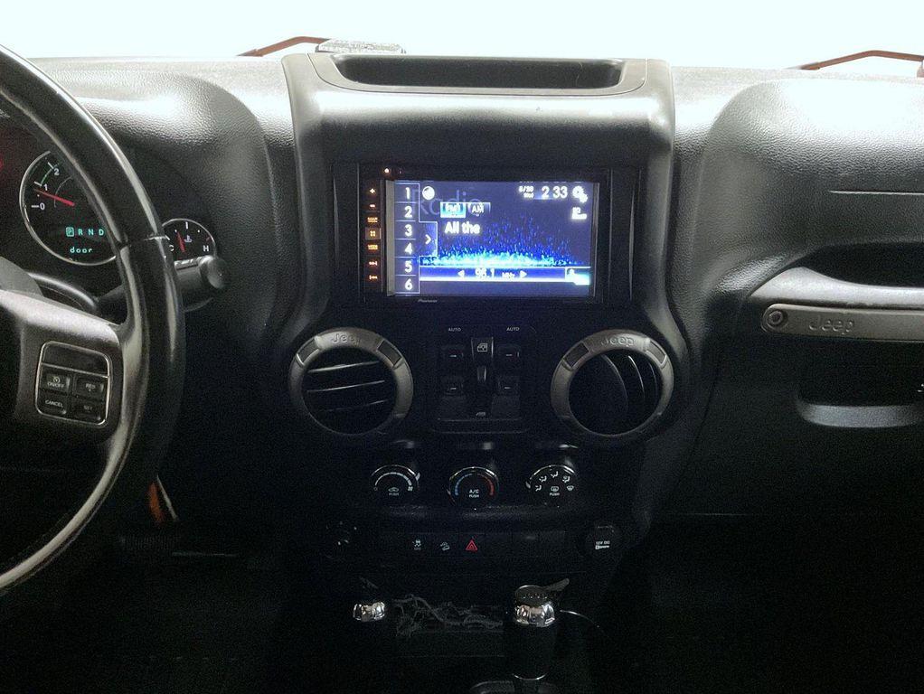used 2013 Jeep Wrangler Unlimited car, priced at $17,655