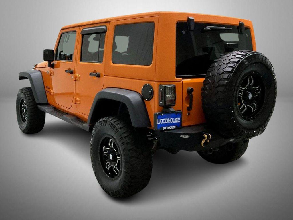 used 2013 Jeep Wrangler Unlimited car, priced at $17,655