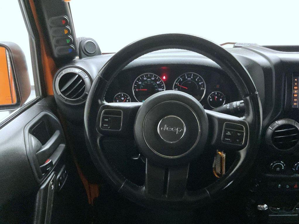 used 2013 Jeep Wrangler Unlimited car, priced at $17,655