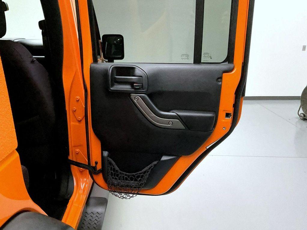 used 2013 Jeep Wrangler Unlimited car, priced at $17,655