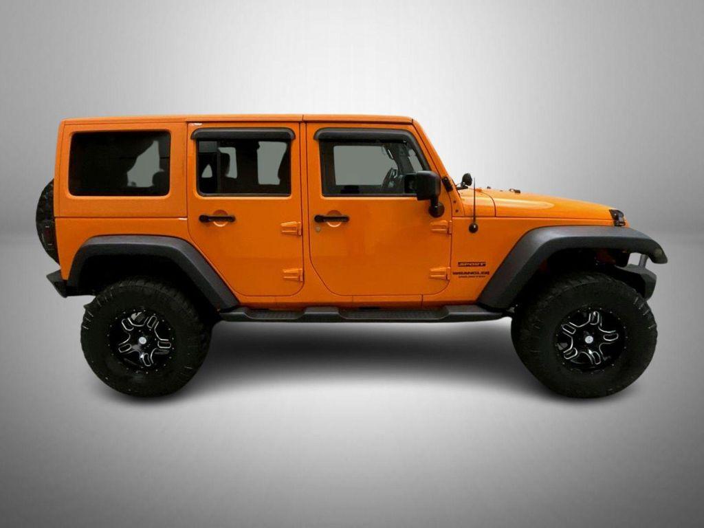 used 2013 Jeep Wrangler Unlimited car, priced at $17,655