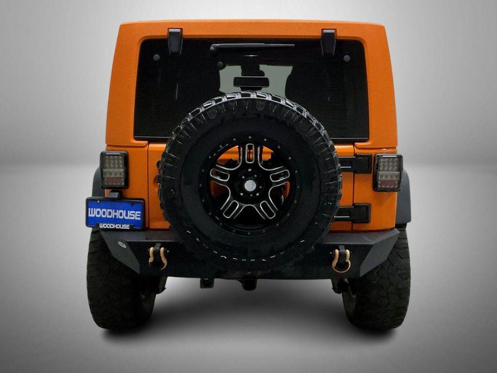 used 2013 Jeep Wrangler Unlimited car, priced at $17,655