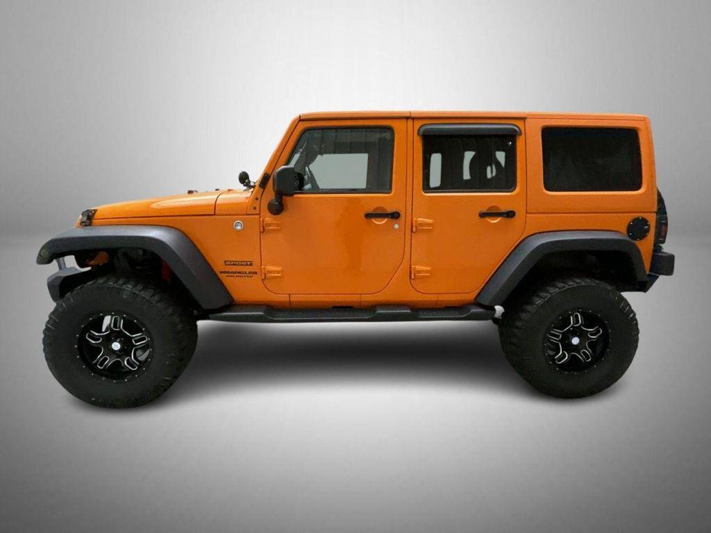 used 2013 Jeep Wrangler Unlimited car, priced at $17,655