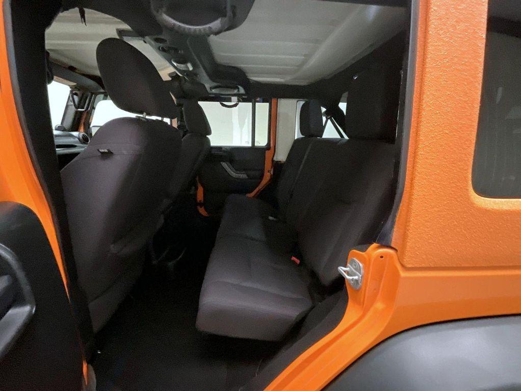 used 2013 Jeep Wrangler Unlimited car, priced at $17,655